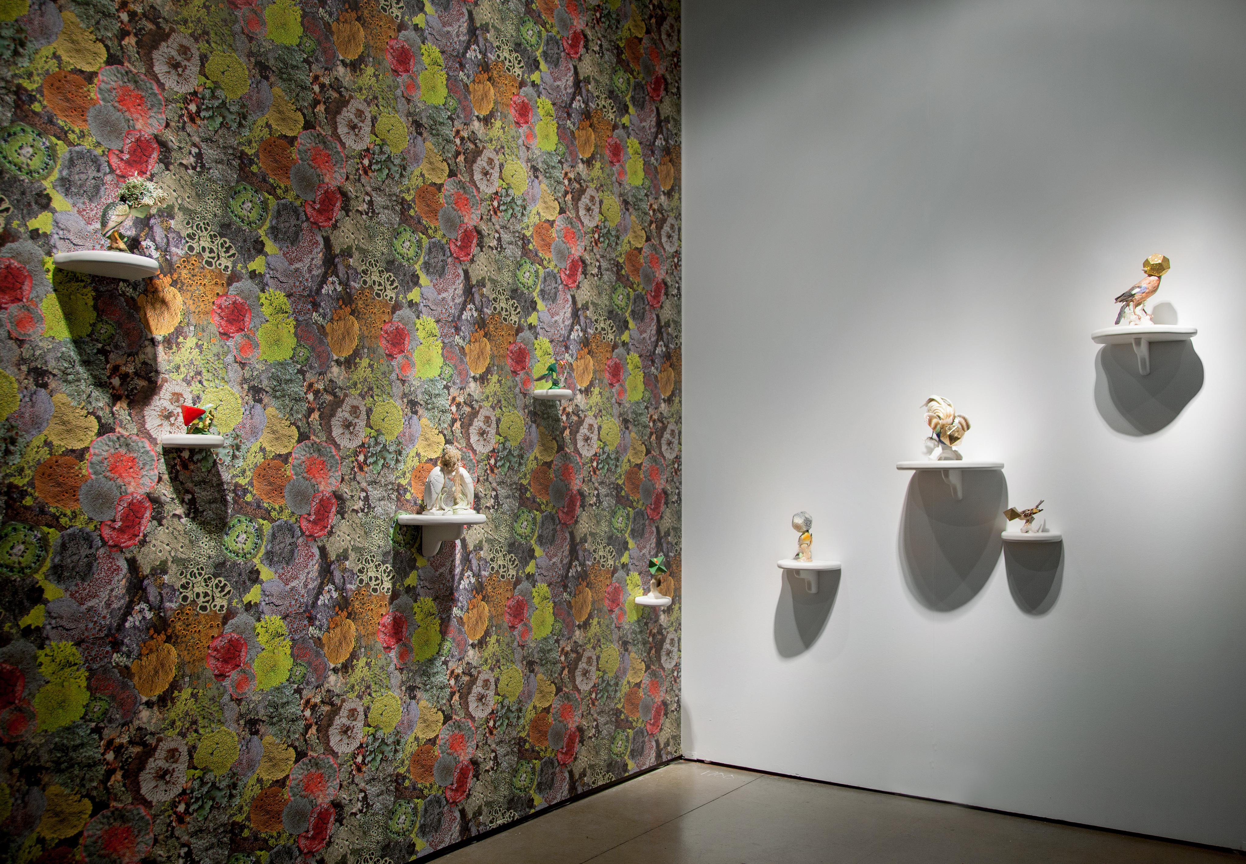 View of Camouflage bird sculptures and Natural Camouflage Lichen Wallpaper, which accompanied Tell it to the Birds at EXPO Chicago
