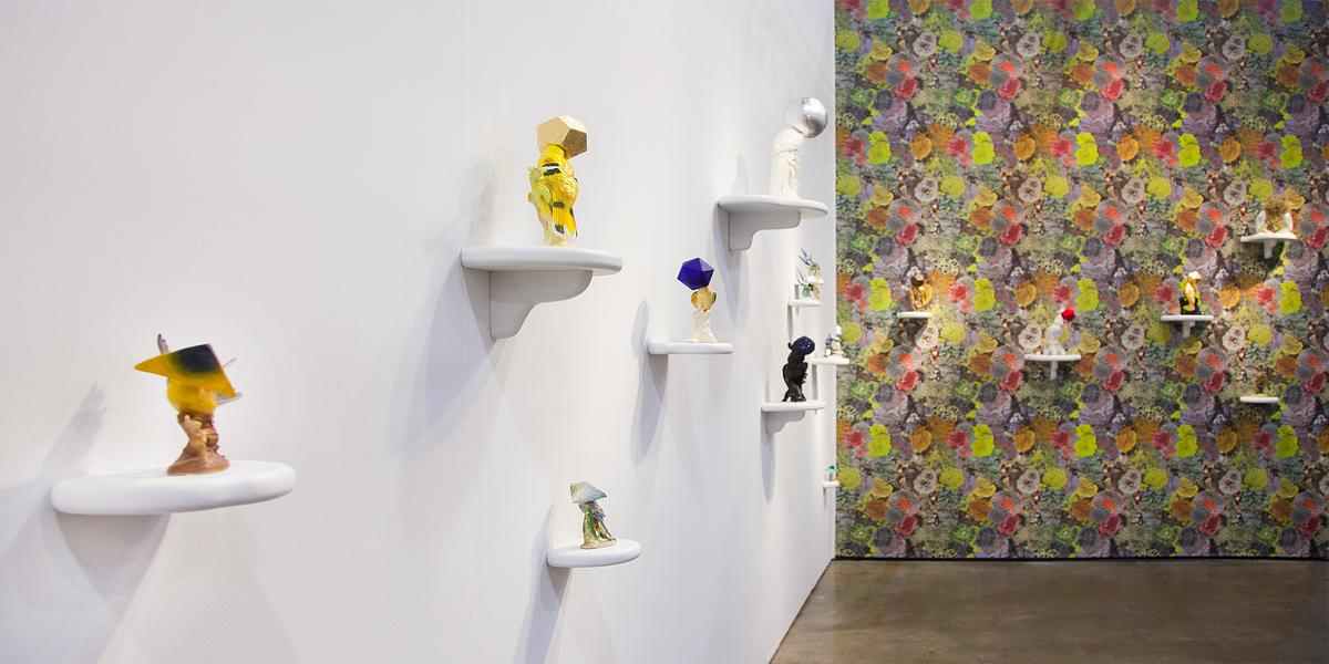 View of Camouflage bird sculptures and Natural Camouflage Lichen Wallpaper, which accompanied Tell it to the Birds at EXPO Chicago View of Camouflage bird sculptures and Natural Camouflage Lichen Wallpaper, which accompanied Tell it to the Birds at EXPO Chicago