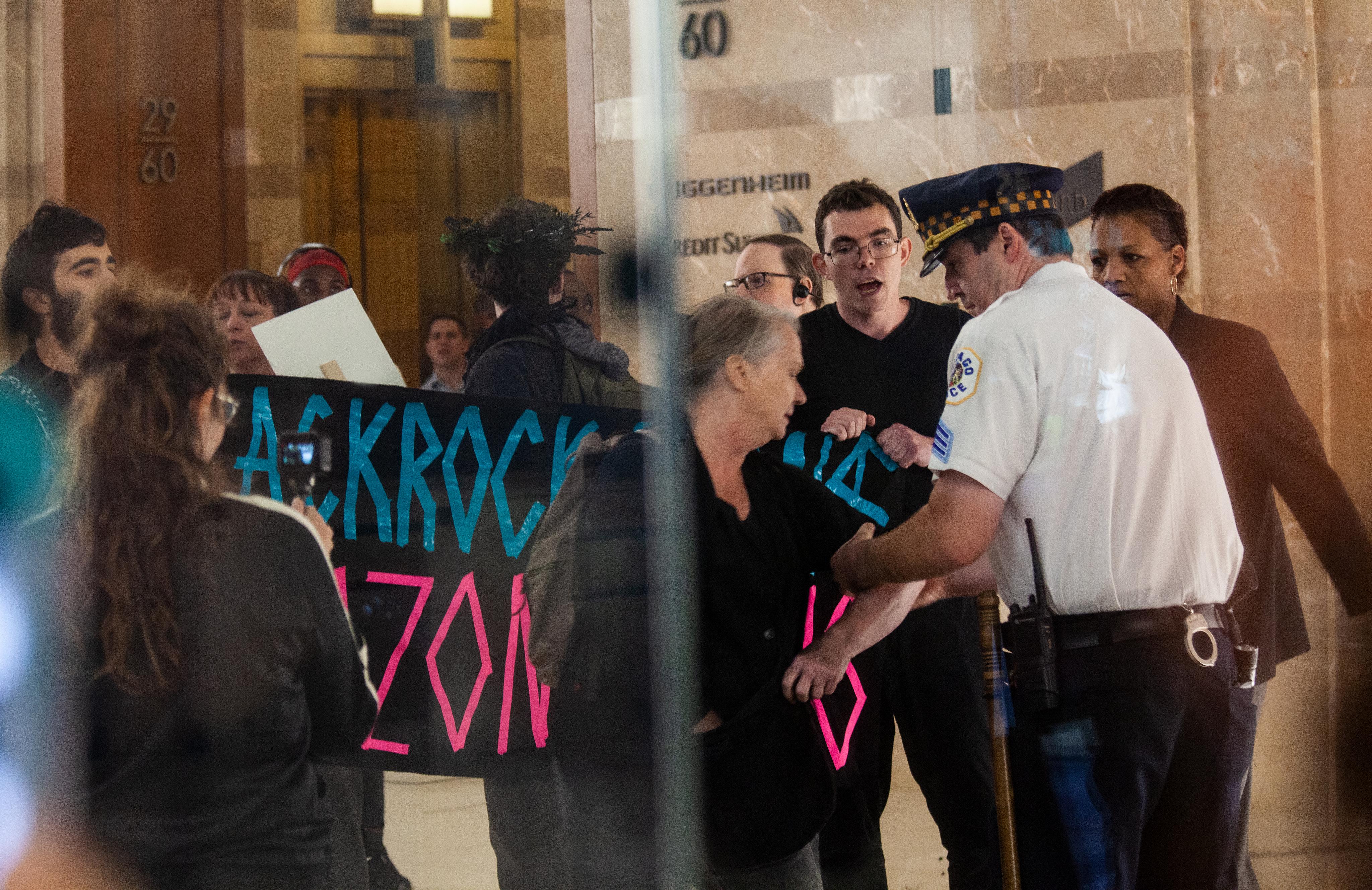 Sept 5th - No Forests, No Life - rally, march and action in solidarity with Amazonia - Activists surprise security at BlackRock's Chicago Headquarters