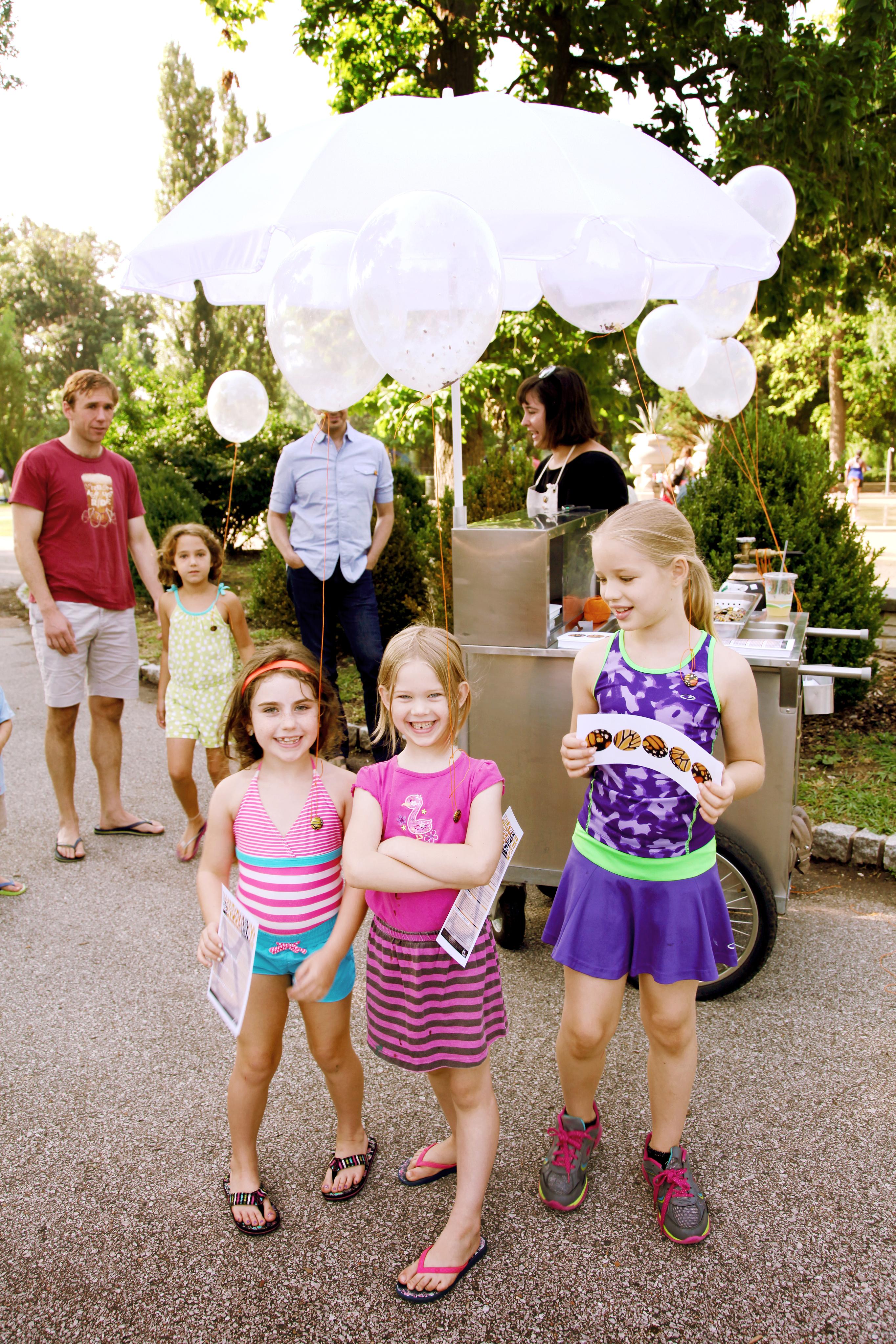 Milkweed Dispersal Balloons at the Tower Grove Farmer's Market